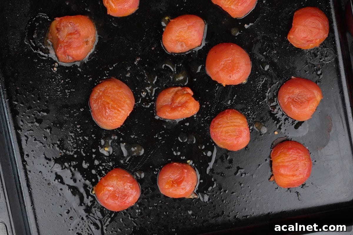 Roasted tomatoes with skin removed.