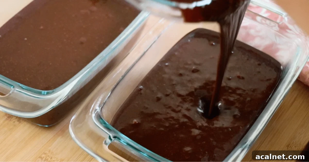 Pouring the chocolate banana cake batter into the prepared pans.