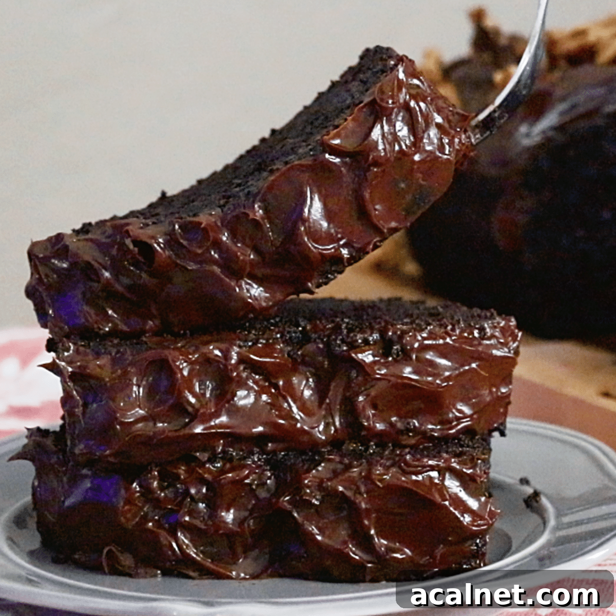3 chocolate banana cake slices with ganache