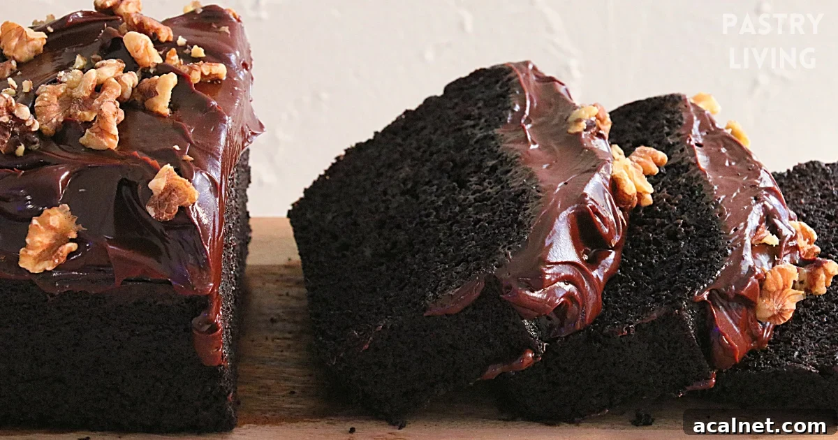 A sliced homemade chocolate banana cakes on a wooden board.