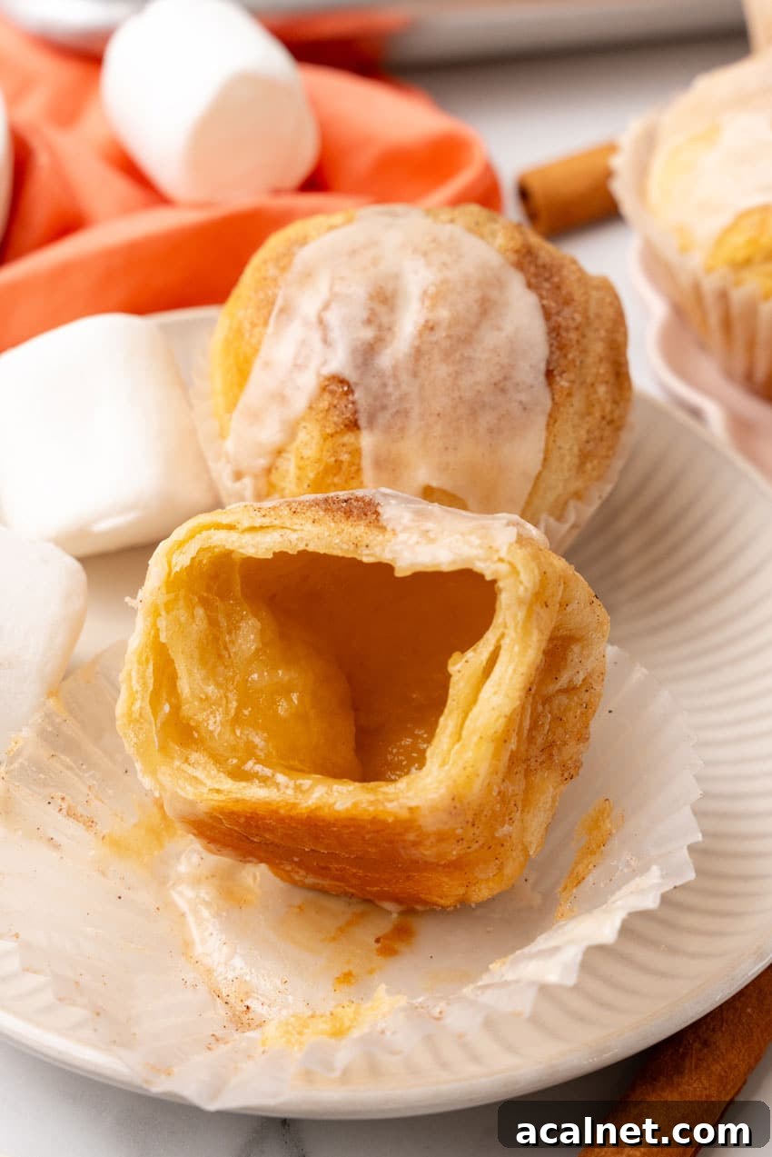 an opened resurrection roll on a small white dessert plate