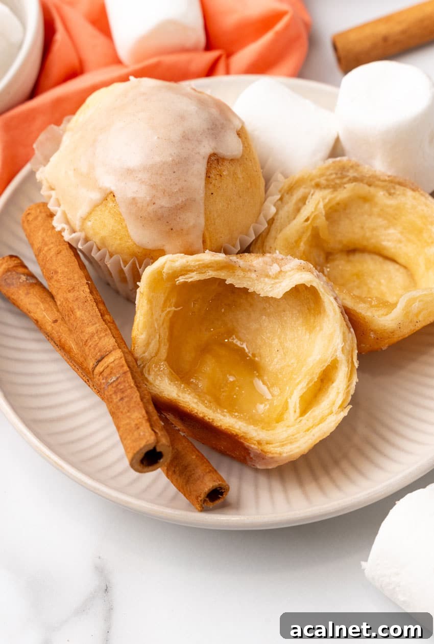 an opened resurrection roll on a small white dessert plate