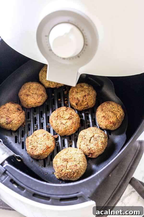 Yes, you can turn chickpeas into falafel using an Air Fryer. This easy Air Fryer falafel recipe shows you how. They made be that dark brown compared to pan-fried or deep-fried falafel but they are just as tasty. Serve as a snack or a full meal with pita bread and a salad.