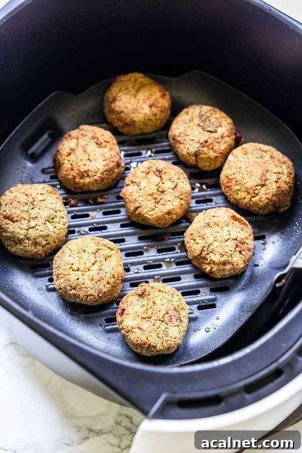 Yes, you can turn chickpeas into falafel using an Air Fryer. This easy Air Fryer falafel recipe shows you how. They made be that dark brown compared to pan-fried or deep-fried falafel but they are just as tasty. Serve as a snack or a full meal with pita bread and a salad.