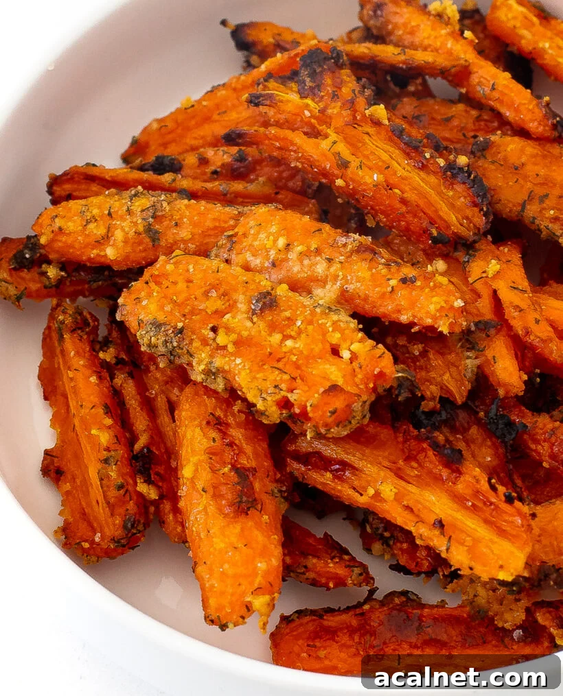 Ranch smashed carrots served in a white serving bowl. 