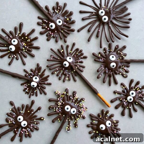 Chocolate pretzel firework treats with candy eyes and sprinkle decorations.