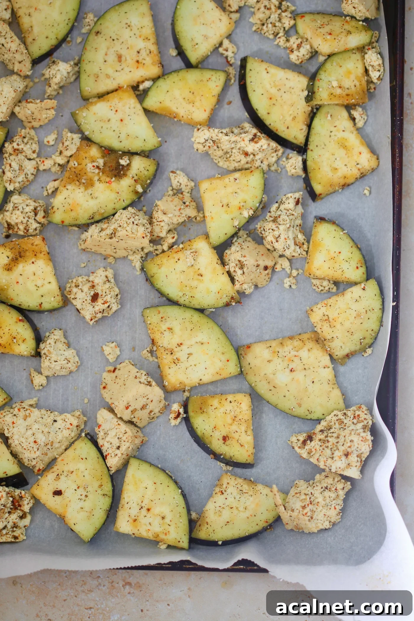 Mediterranean Tofu & Roasted Eggplant with Tahini Yogurt Sauce 6 eggplant and tofu on baking sheet.