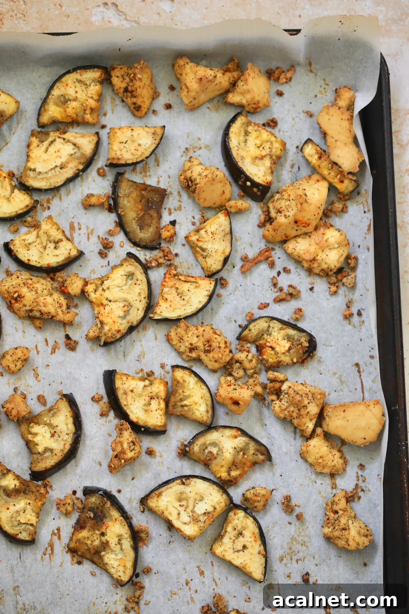 Mediterranean Tofu & Roasted Eggplant with Tahini Yogurt Sauce 7 baked tofu and eggplant on sheet pan.