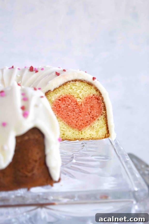 sliced open bundt cake showing heart inside