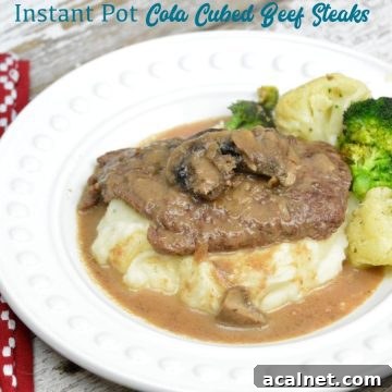 Instant Pot Coca-Cola Cubed Beef Steaks is a simple recipe made quickly with the dump of cubed steaks, a Coke, onion soup mix and cream of mushroom soup in the Instant Pot.