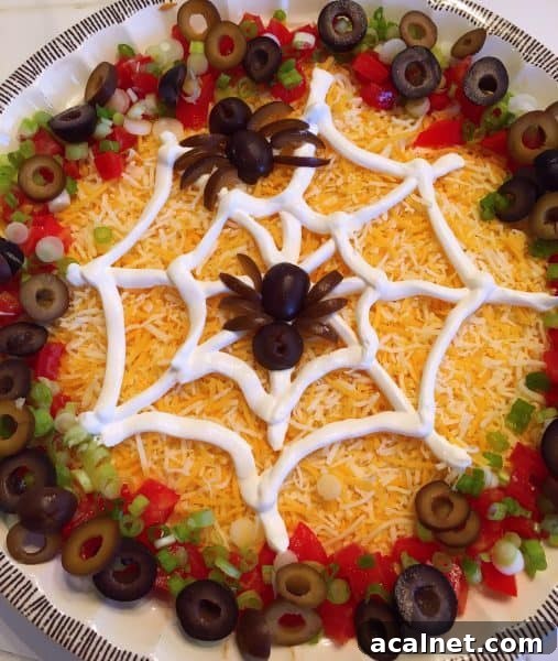 Sour cream spider web on dip