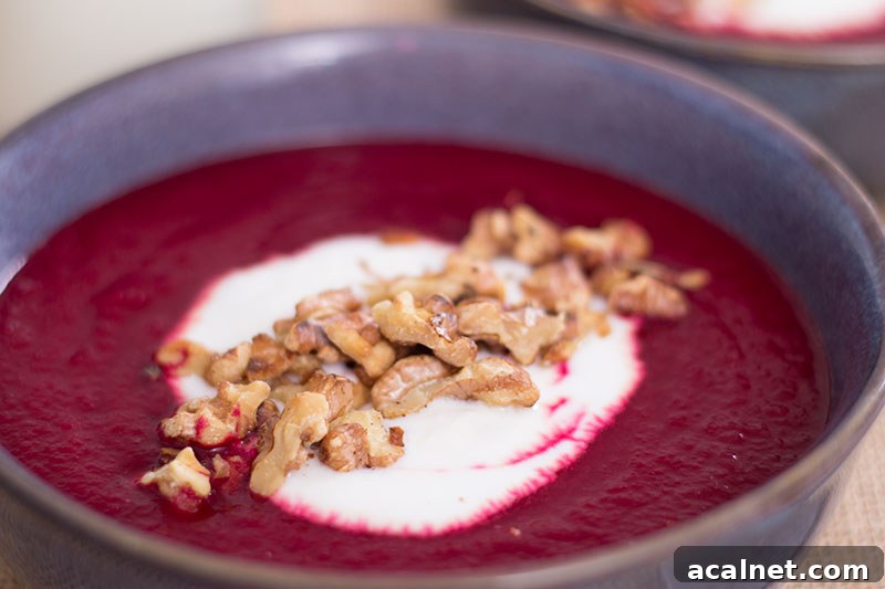 Beetroot apple and horseradish soup with walnuts and yoghurt