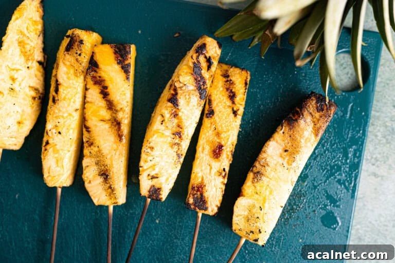 Grilled pineapple on a plate.