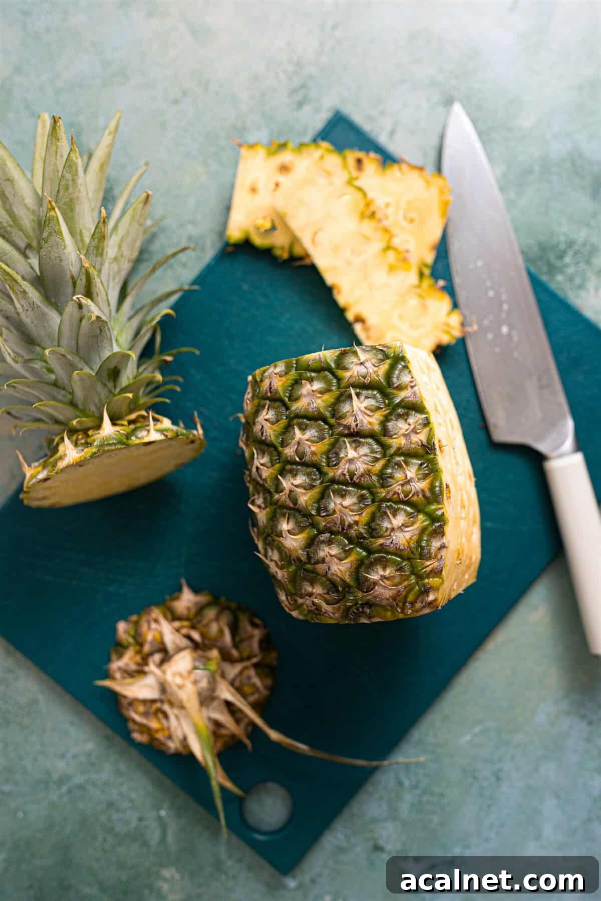 Pineapple with skin cut off.
