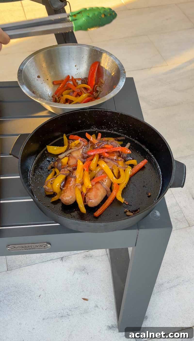 Cheese melting over sausages