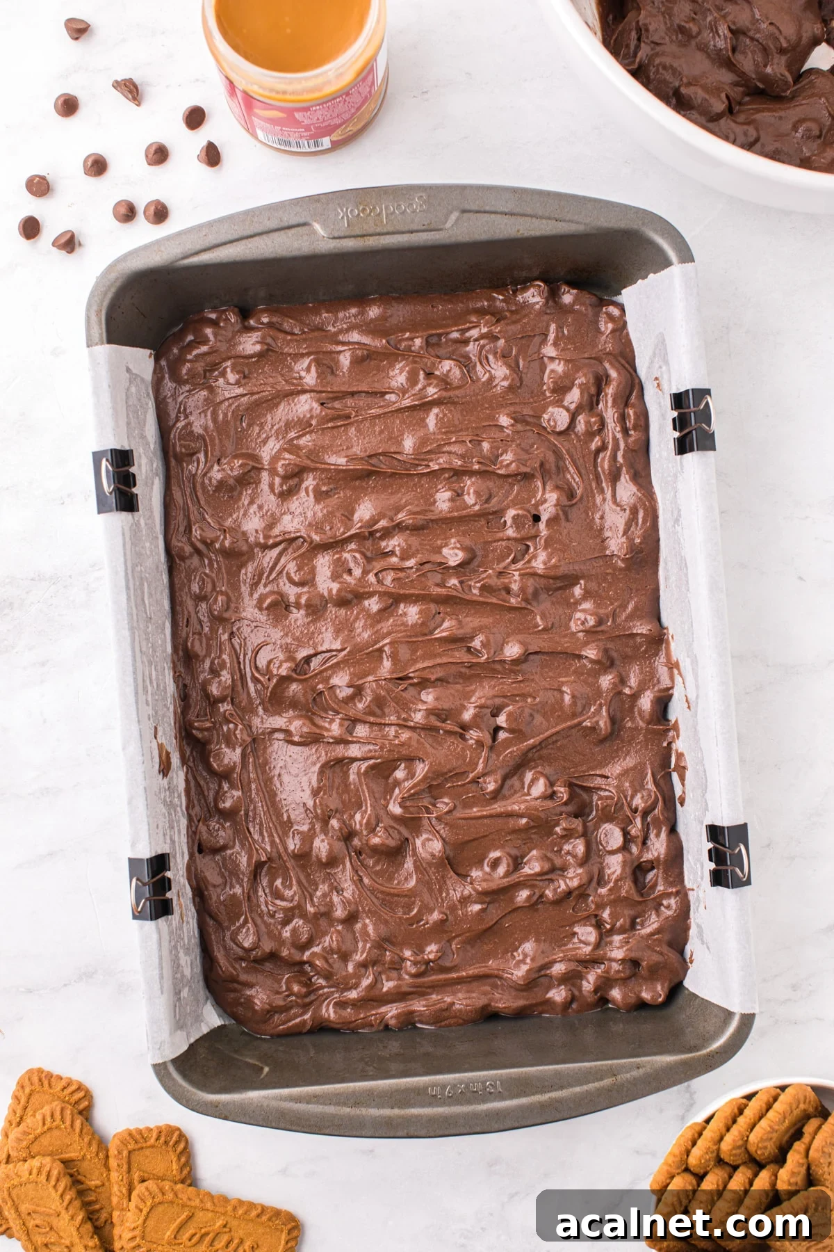 A baking pan filled with brownie batter.