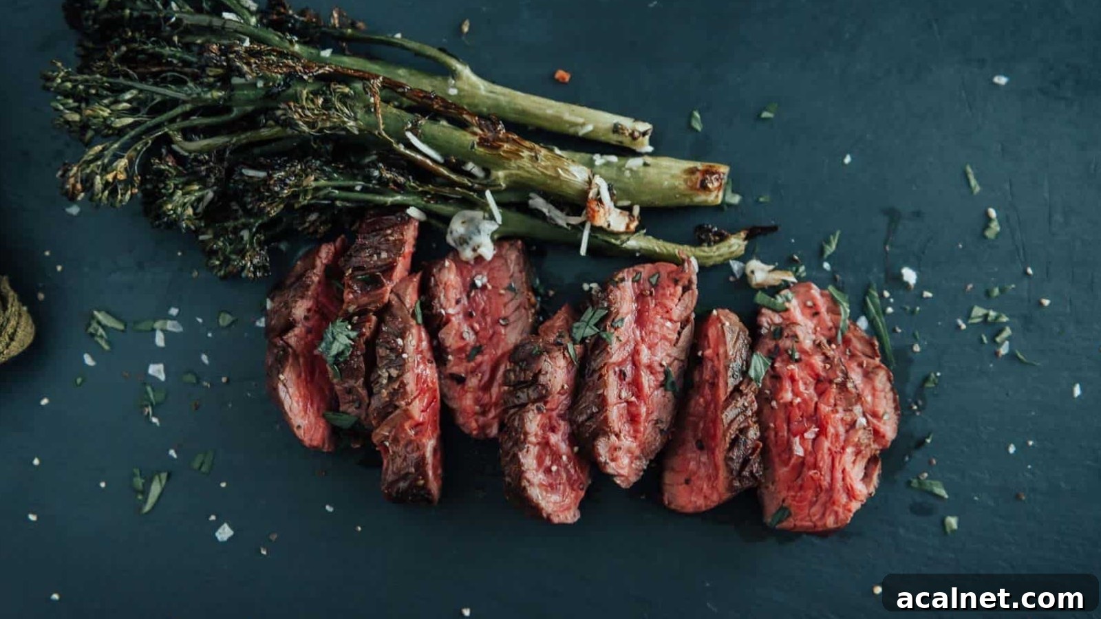 Pan-seared hanger steak with caramelized crust sliced against the grain.