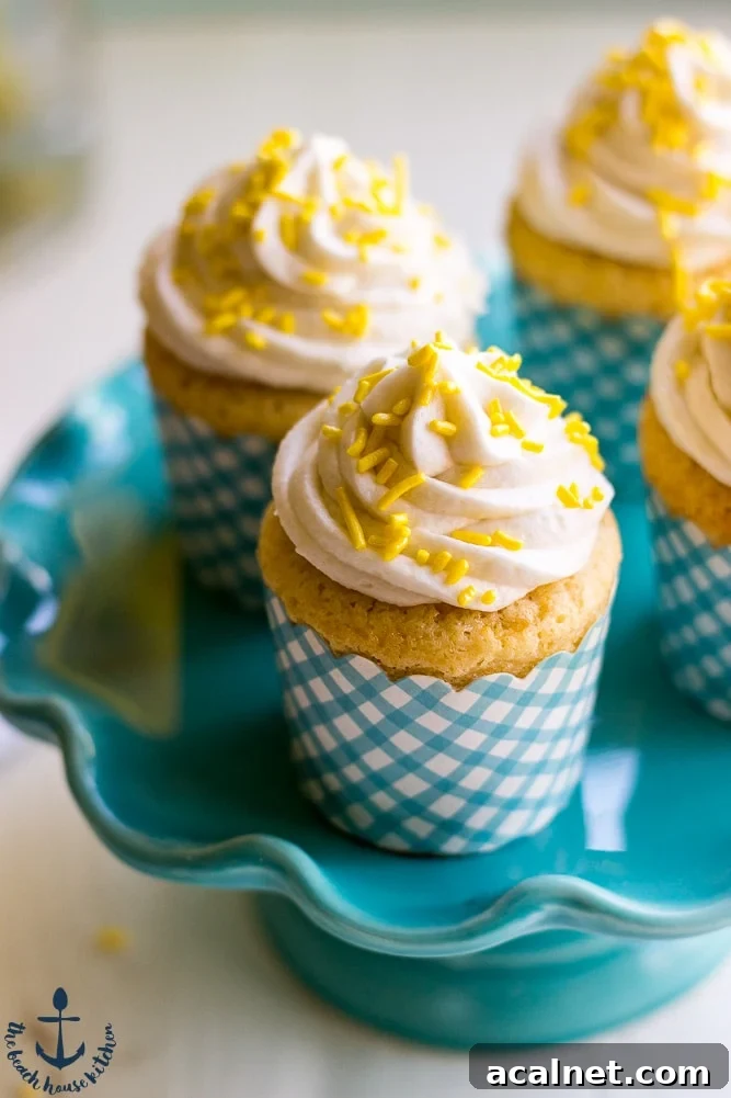 Lemon Cupcakes Filled with Lemon Curd Topped with Vanilla Buttercream-