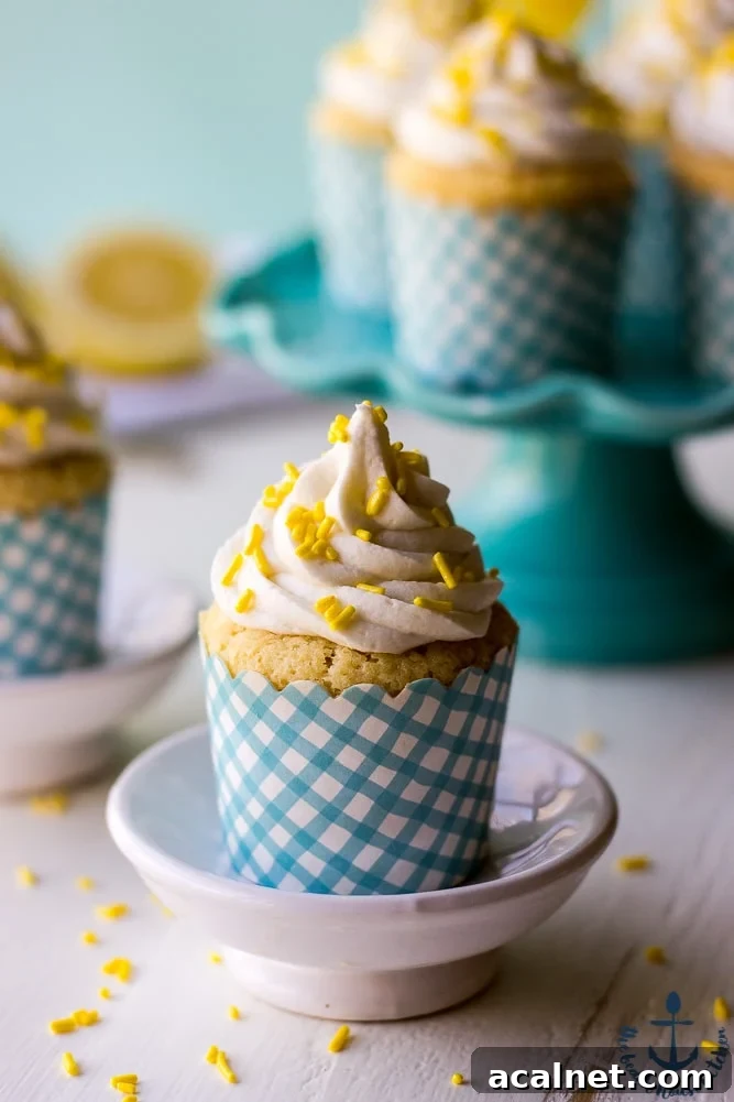 Lemon Cupcakes Filled with Lemon Curd Topped with Vanilla Buttercream-