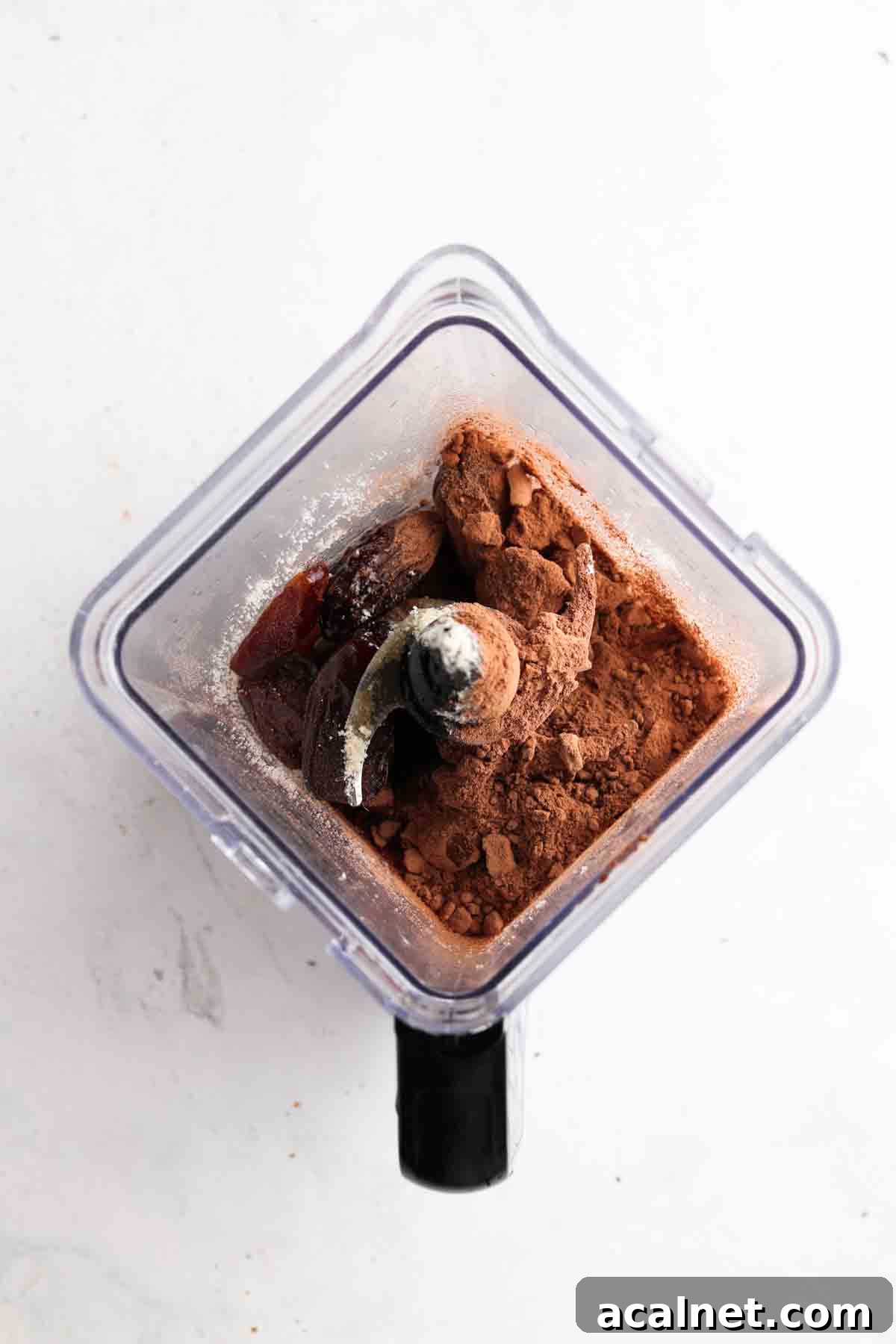 Gluten free brownie crust ingredients in the blender.