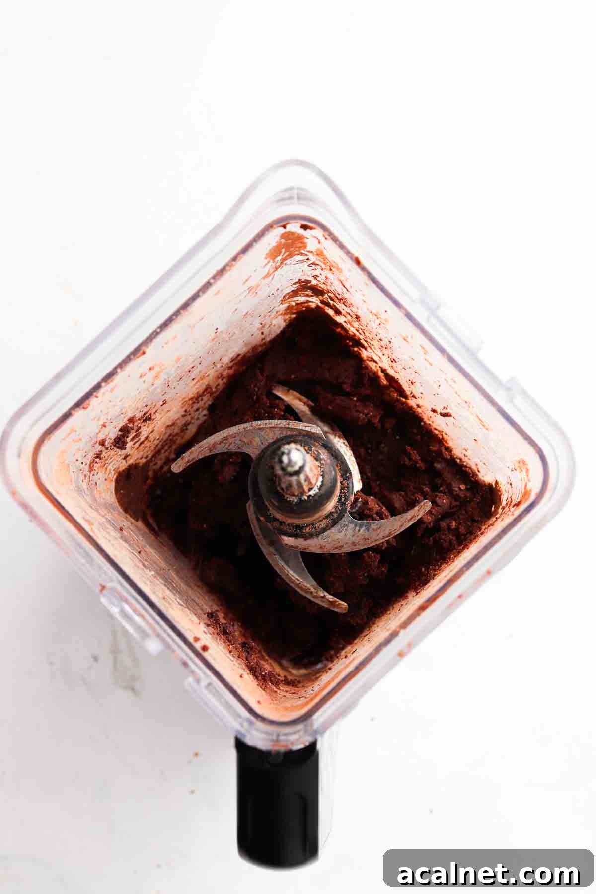Blended up brownie batter for the cheesecake crust.