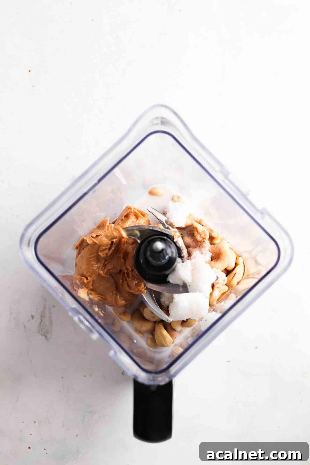 Cashew peanut butter cream filling ingredients in a blender.