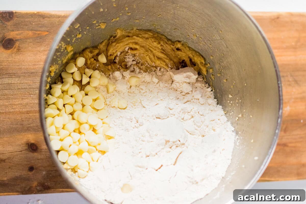 Halloween Sprinkle Cookie Recipe for Festive Party Treats 10 Cookie dough ingredients in a mixing bowl.