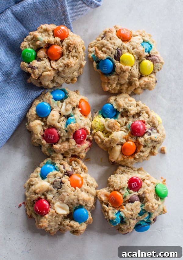 Gluten Free Monster Cookies-- a healthy peanut butter oatmeal cookie recipe with m and ms... your favorite monster trail mix in flourless cookie form.