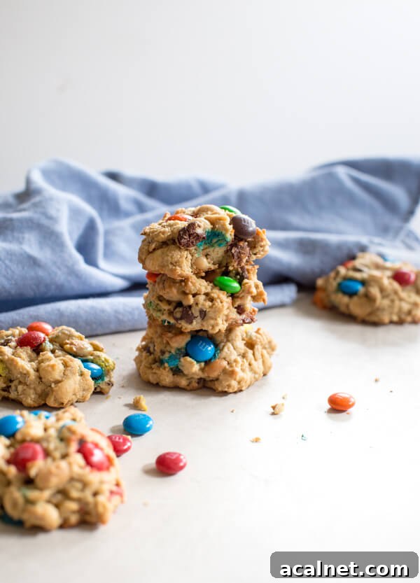 Gluten Free Monster Cookies-- a healthy peanut butter oatmeal cookie recipe with m and ms... your favorite monster trail mix in flourless cookie form.