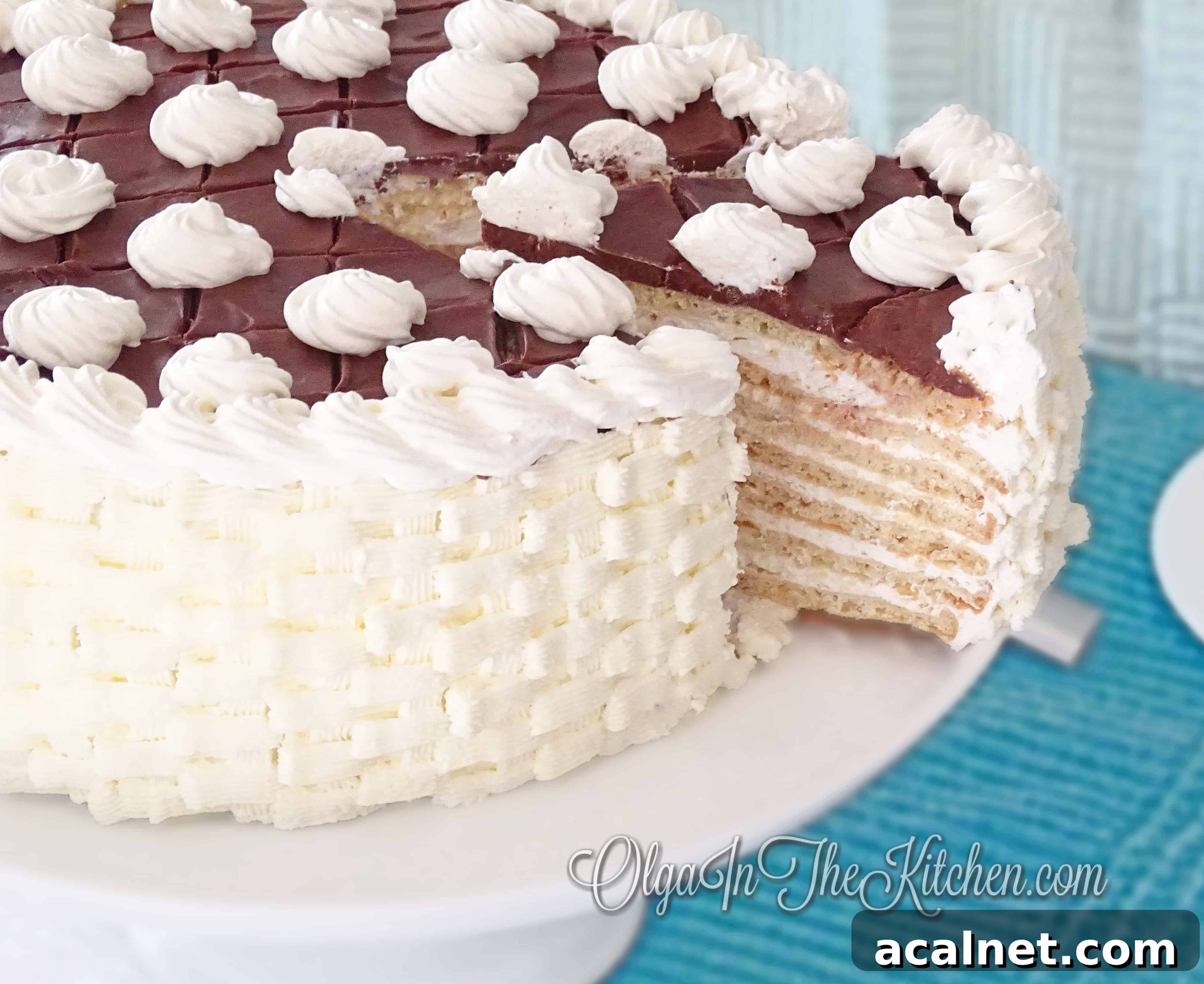 Ammonia White Cake with Sour Cream Frosting: dry cake layers creamed with sour cream frosting, topped with chocolate ganache.