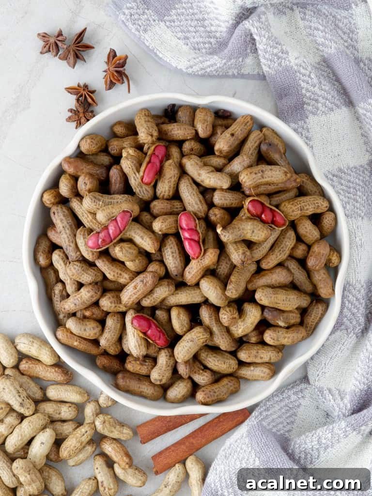 slow cooker peanuts in a white bowl