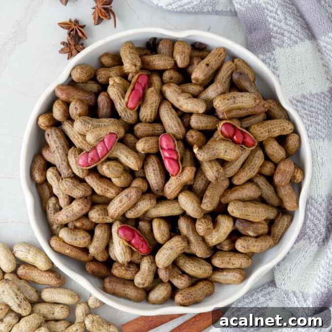 slow cooker peanuts in a white bowl