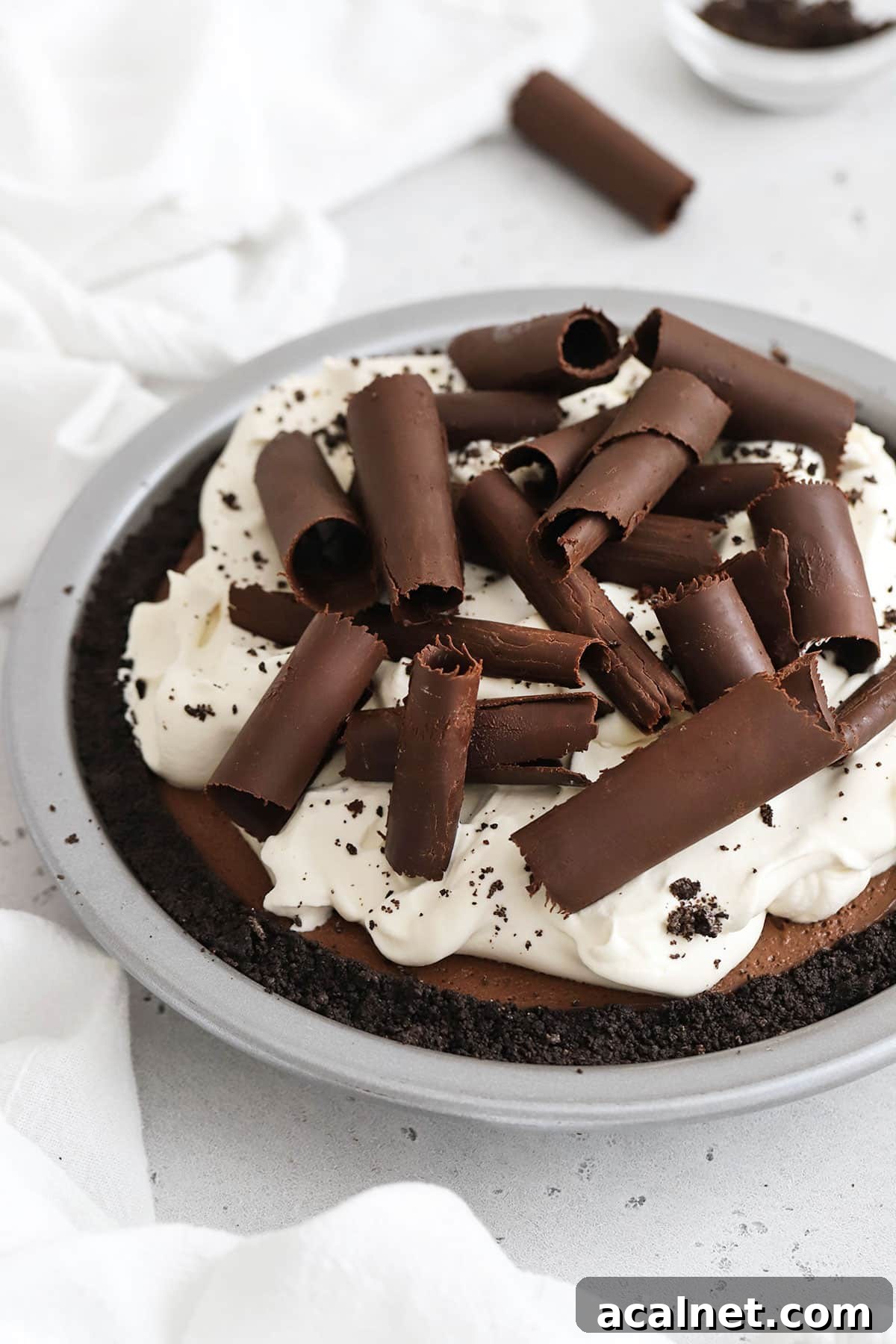 Decadent Gluten-Free Chocolate Pie Recipe for Chocolate Lovers 6 3 layer gluten-free chocolate pie topped with chocolate curls and whipped cream