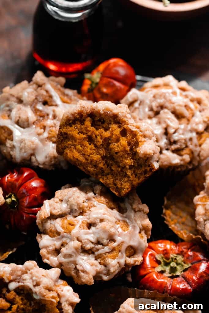 A pile of fluffy pumpkin muffins.