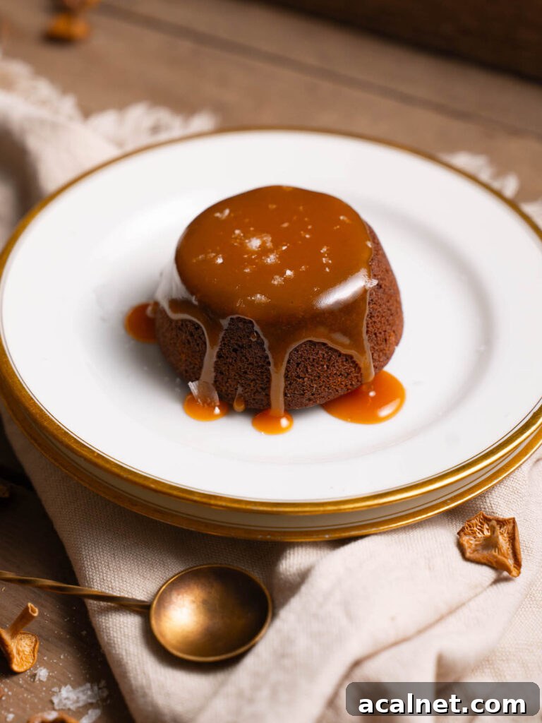 Caramel dripping off a mini chocolate cake