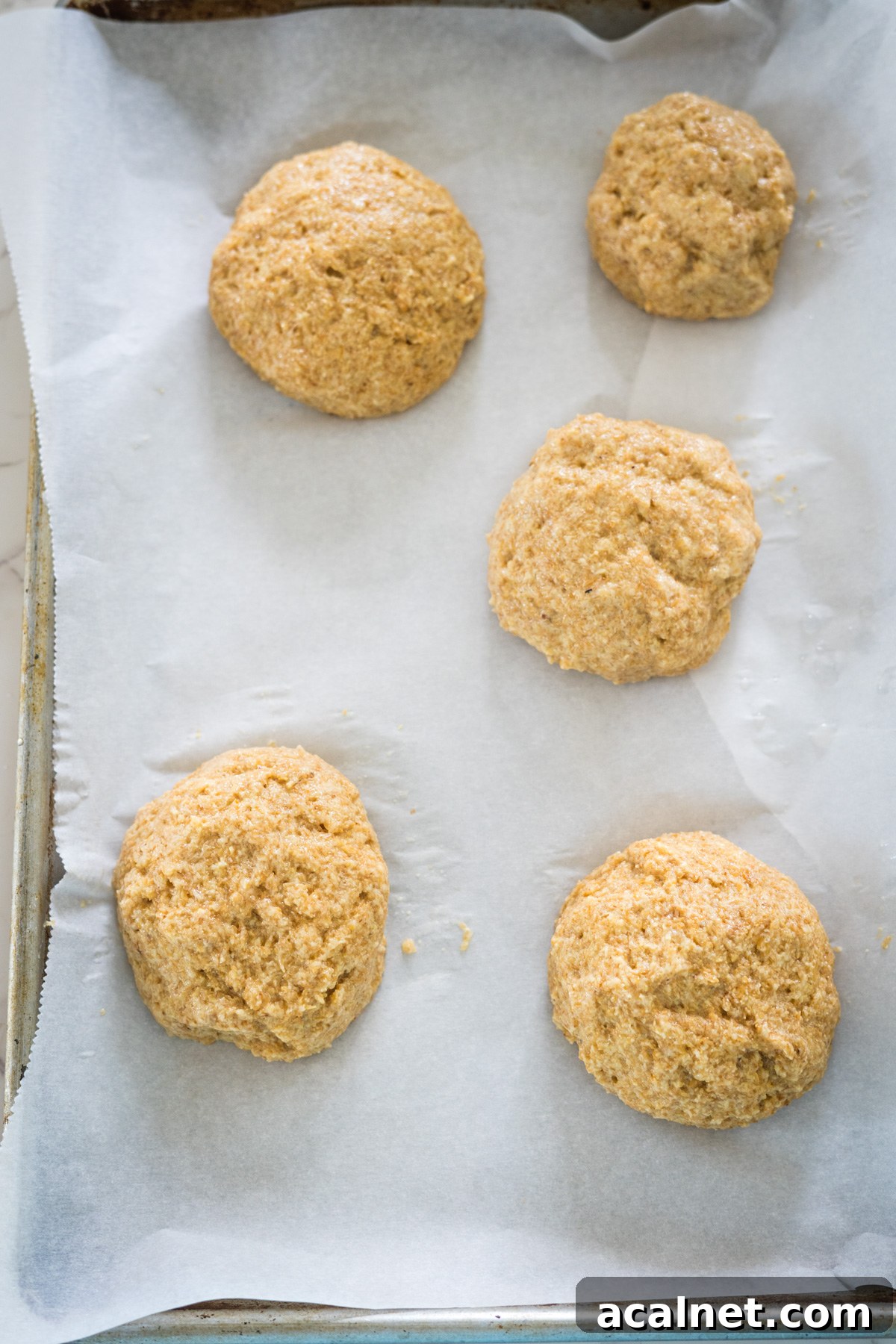 A tray of flaxseed cookies on a baking sheet.