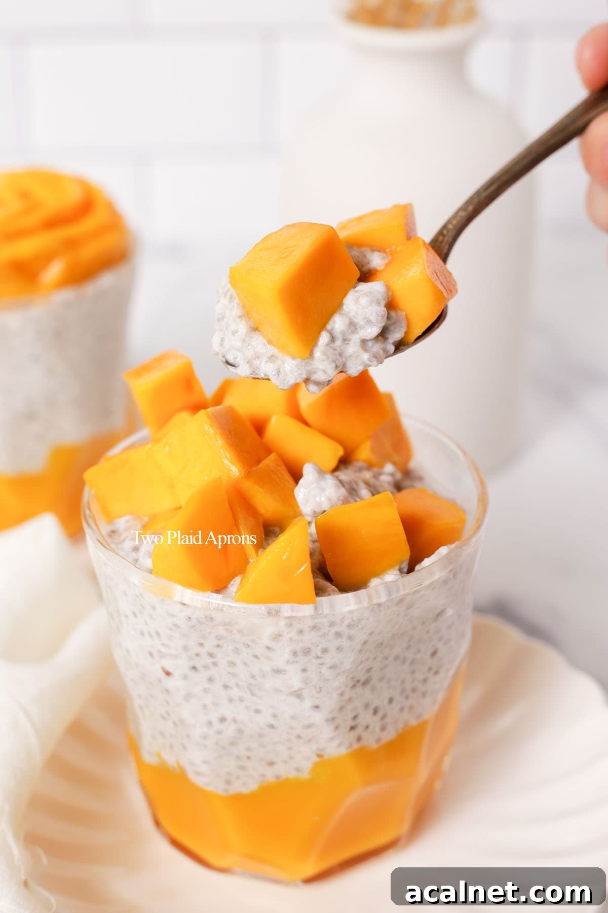 Spoonful of mango chia seed pudding.