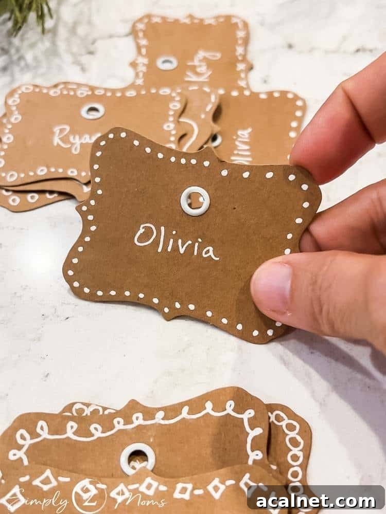 Kraft gift tags with white gel pen borders and white eyelets