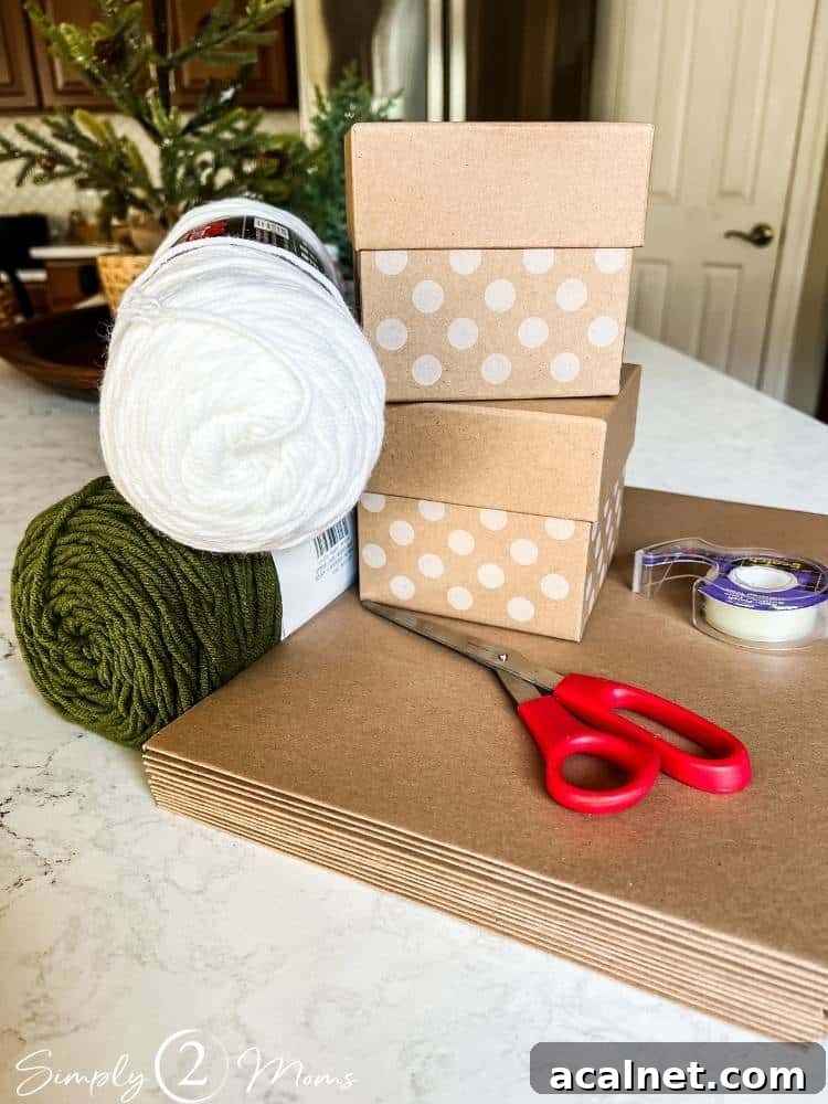 Skeins of white and green yarn with Kraft boxes, scissors, and tape