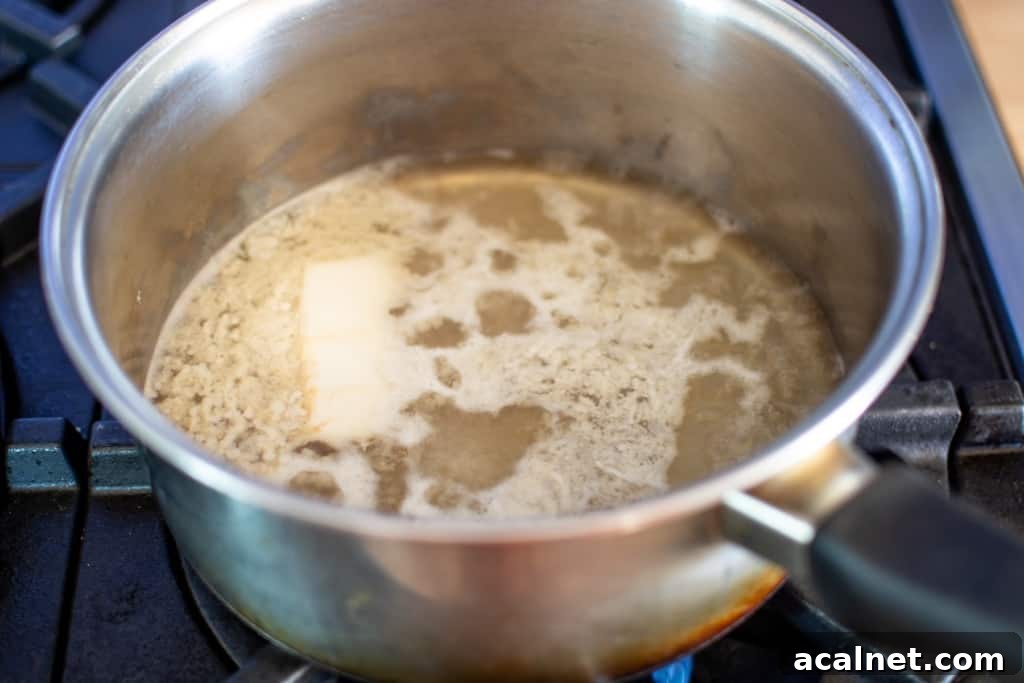 Liquid boiling in a saucepan on the stove