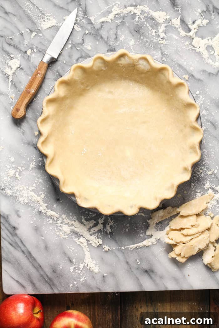 Homemade Apple Crumb Pie with Cinnamon Streusel 3 Pie crust in a pie plate ready for filling