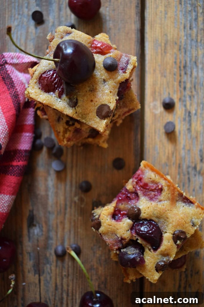 two stacks of cherry chocolate chip blondies