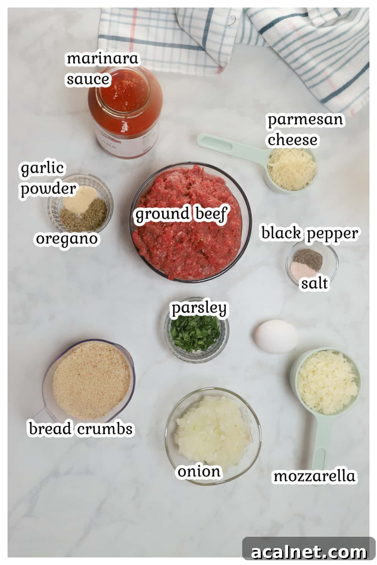 Meatballs ingredients on a countertop.