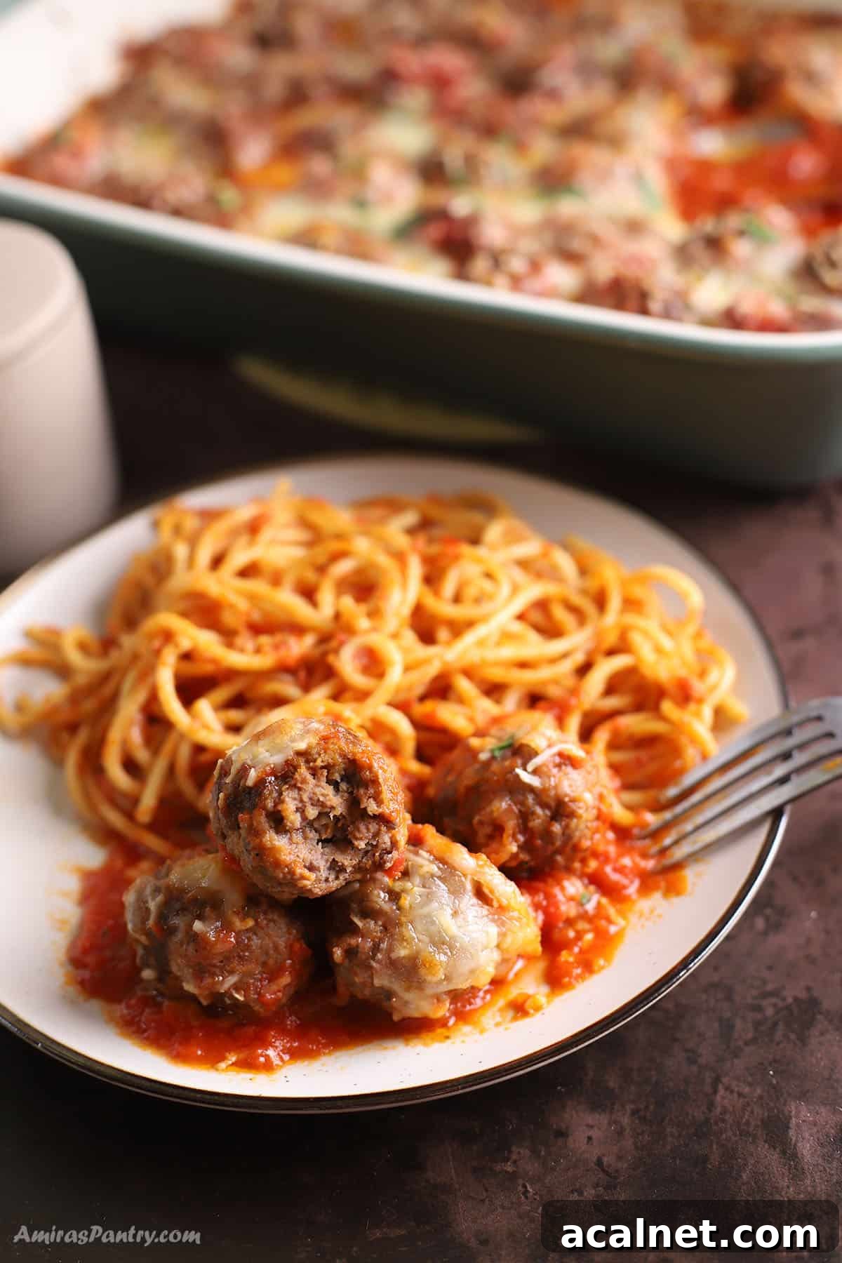 Baked meatballs served in a dish.
