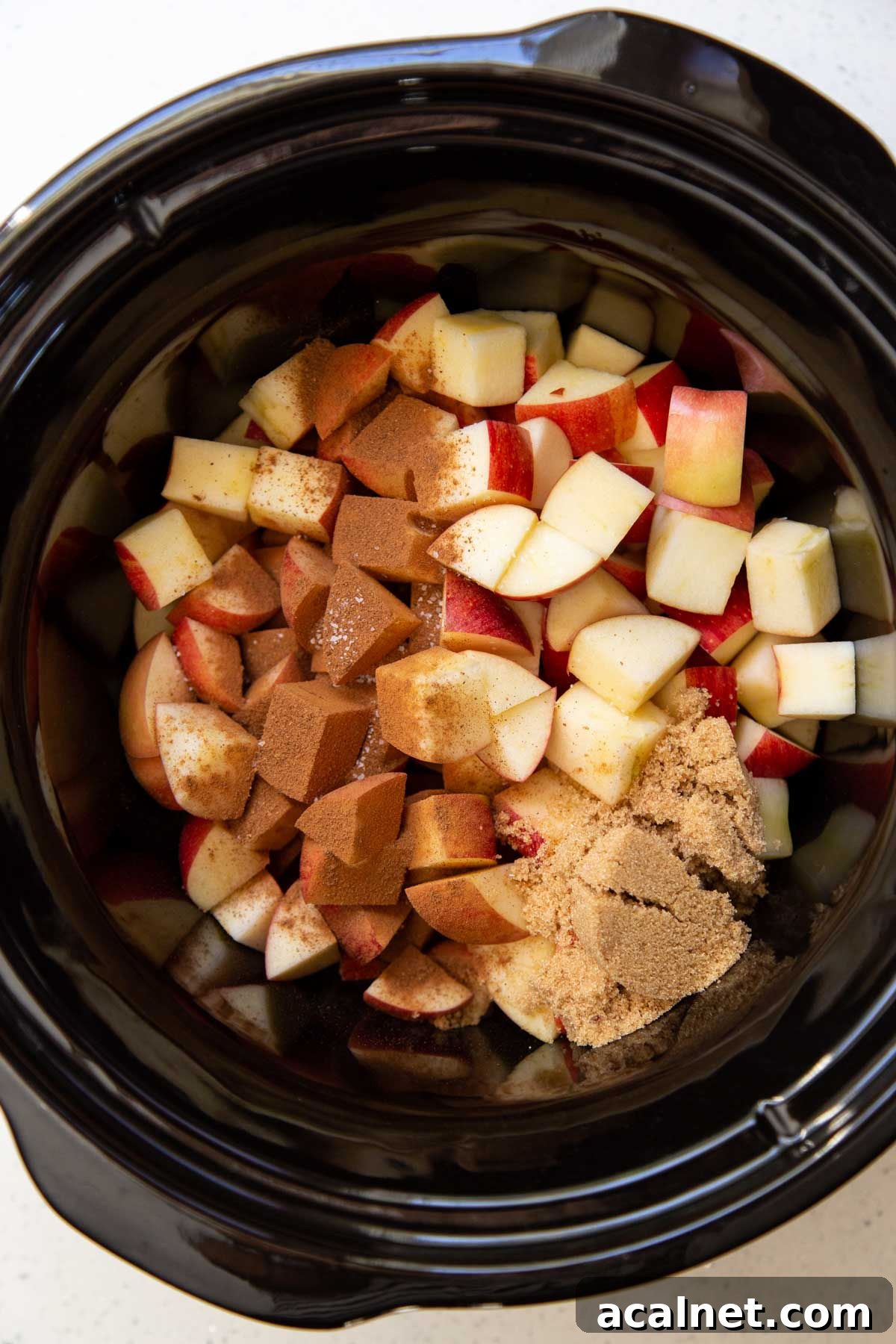 Slow Cooker Apple Butter Recipe: Homemade Fall Spread 2 Ingredients for apple butter in a slow cooker.