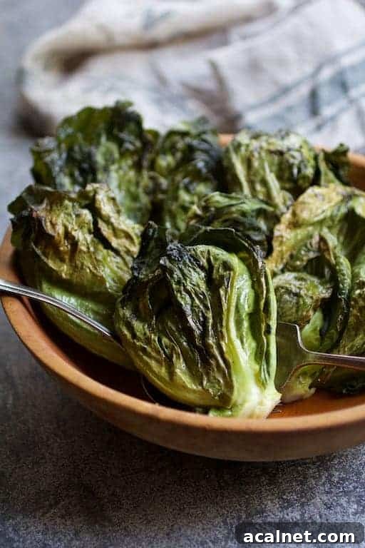 Photo of Duck Fat Roasted Cabbage Sprouts in wooden bowl.