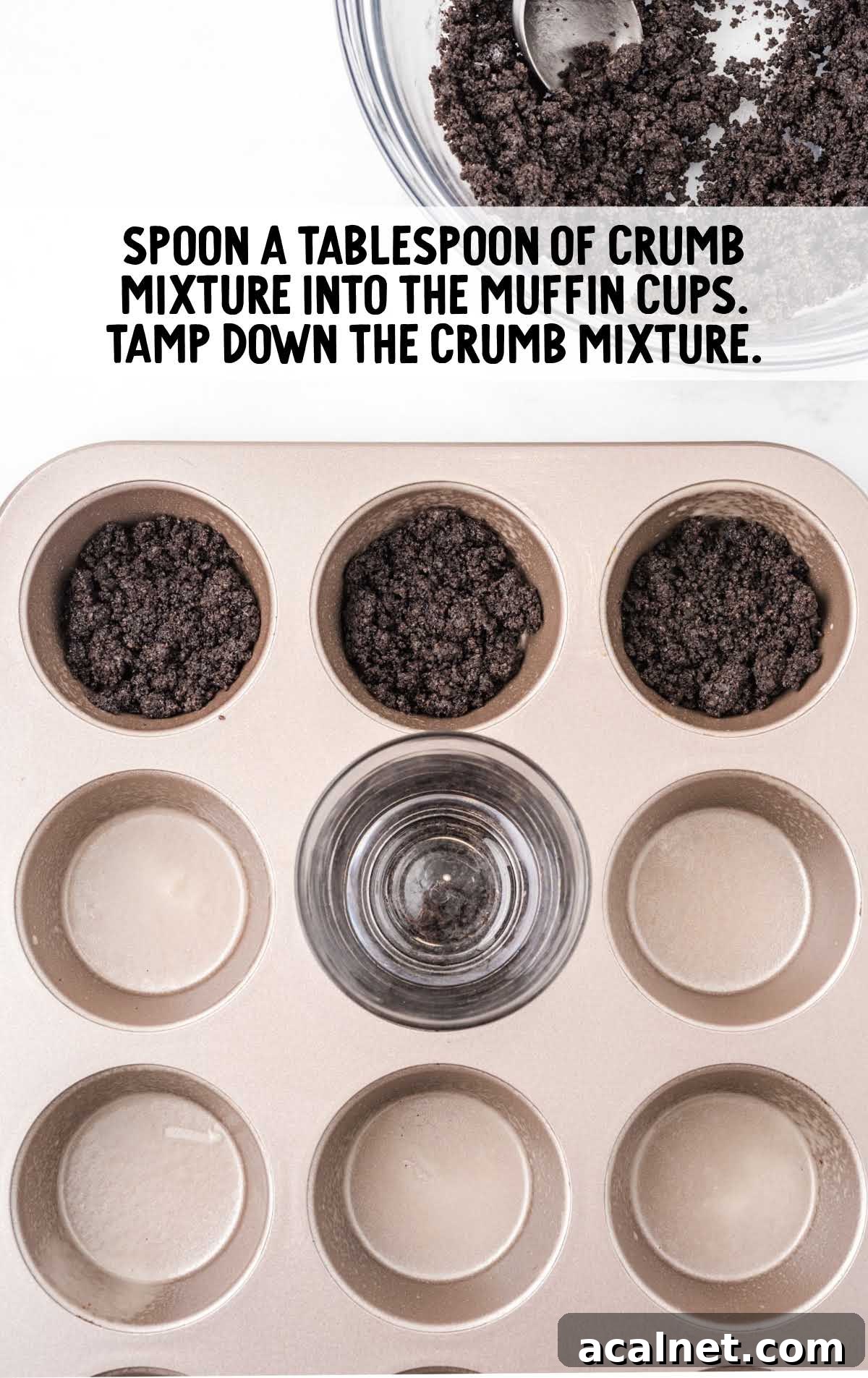 Cookies and Cream Cheesecake with Oreo Crust 5 crumb mixture being spooned into muffin cups