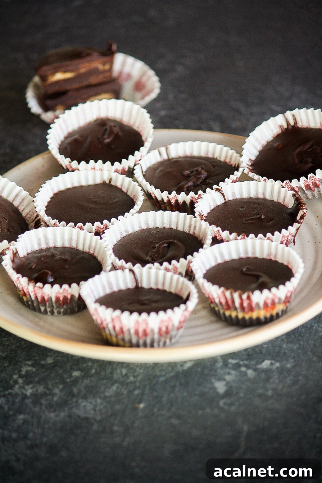 Homemade, super easy peanut butter cups with dark chocolate!