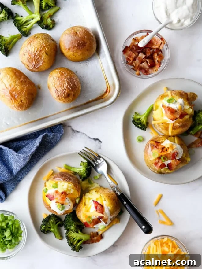 plating baked potato servings with toppings and sheet pan in the corner