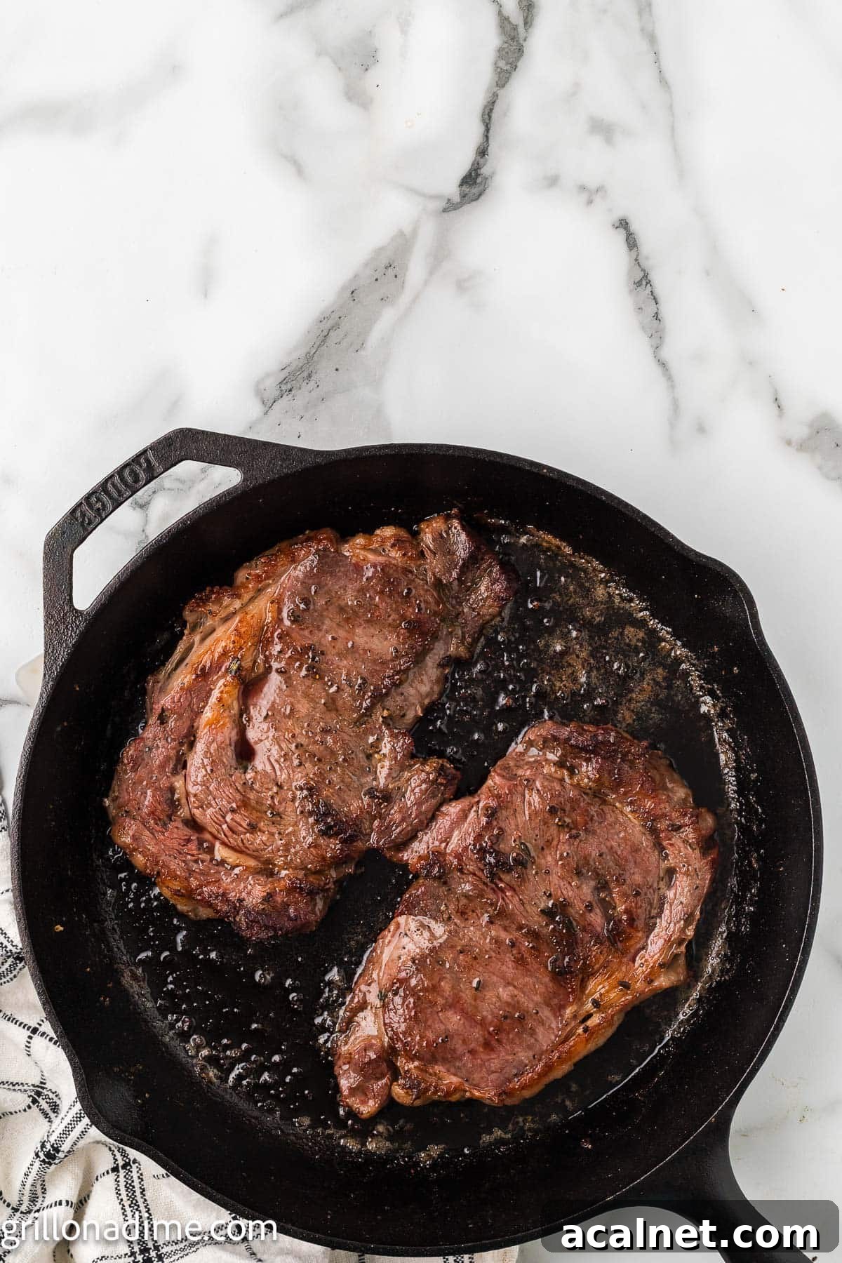 Cooked steaks in a cast iron skillet